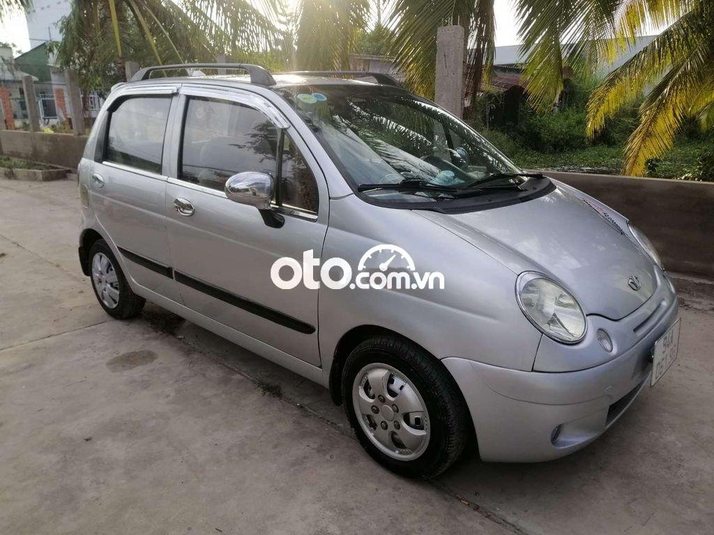 Daewoo Matiz MT 2004 - Bán Daewoo Matiz MT năm 2004, màu bạc, xe nhập xe gia đình