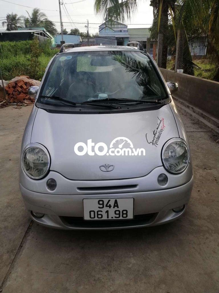 Daewoo Matiz MT 2004 - Bán Daewoo Matiz MT năm 2004, màu bạc, xe nhập xe gia đình