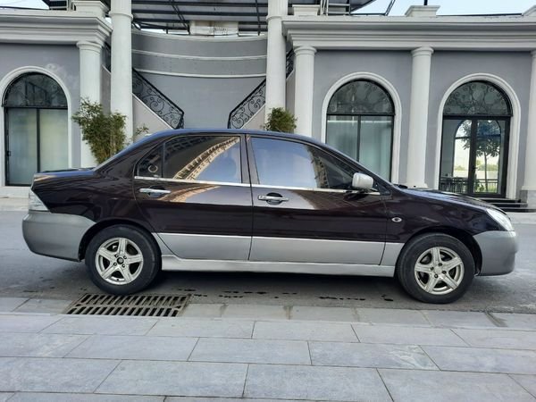 Mitsubishi Lancer 1.6 2003 - Cần bán Mitsubishi Lancer 1.6 sản xuất năm 2003, màu nâu giá cạnh tranh