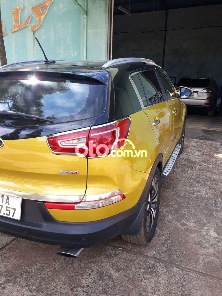 Kia Sportage 2011 - Cần bán gấp Kia Sportage 1.6GDi sản xuất năm 2011, màu vàng, nhập khẩu