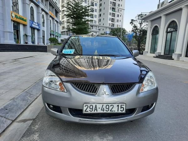 Mitsubishi Lancer 1.6 2003 - Cần bán Mitsubishi Lancer 1.6 sản xuất năm 2003, màu nâu giá cạnh tranh