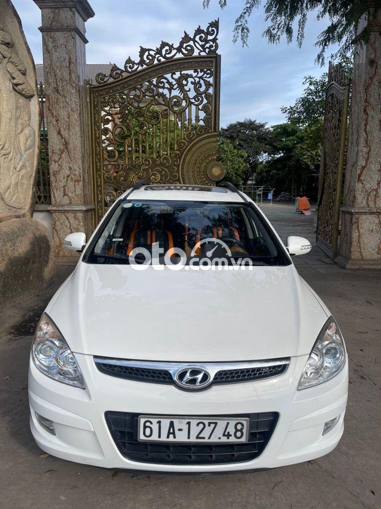 Hyundai i30 CW 1.6AT 2009 - Cần bán lại xe Hyundai i30 CW 1.6AT năm 2009, màu trắng