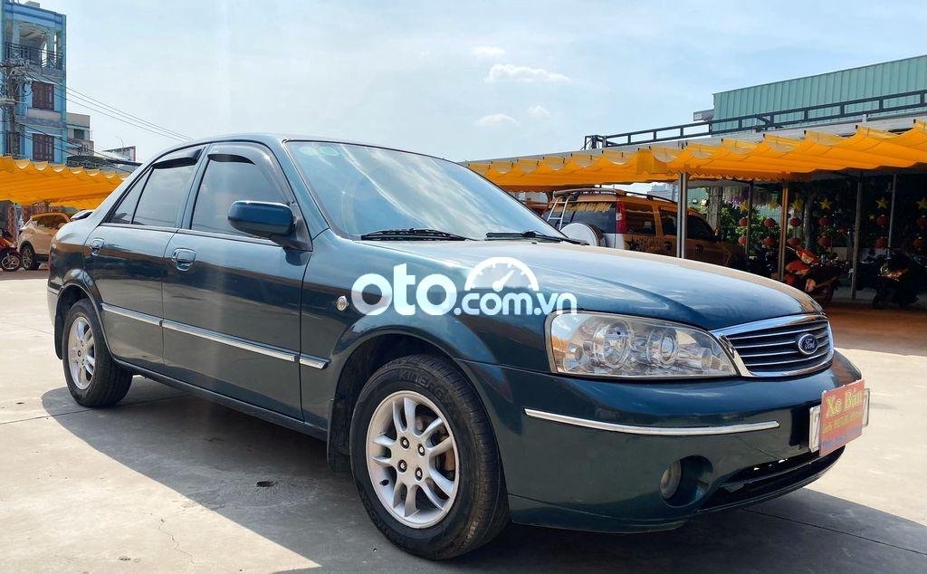 Ford Laser 1.6MT 2003 - Cần bán Ford Laser 1.6MT sản xuất 2003, màu xanh lam, giá tốt