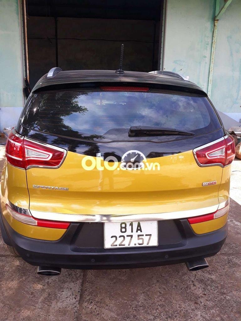 Kia Sportage 2011 - Cần bán gấp Kia Sportage 1.6GDi sản xuất năm 2011, màu vàng, nhập khẩu