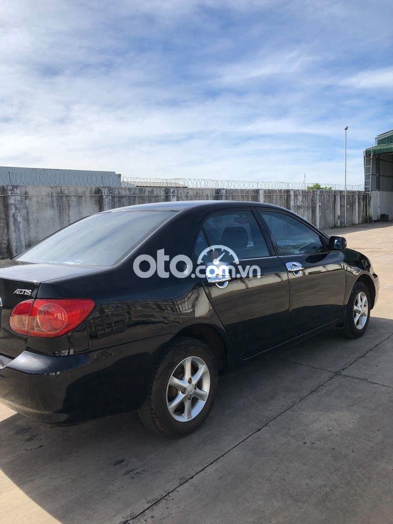 Toyota Corolla 1.8MT 2003 - Bán xe Toyota Corolla 1.8MT năm sản xuất 2003, màu đen