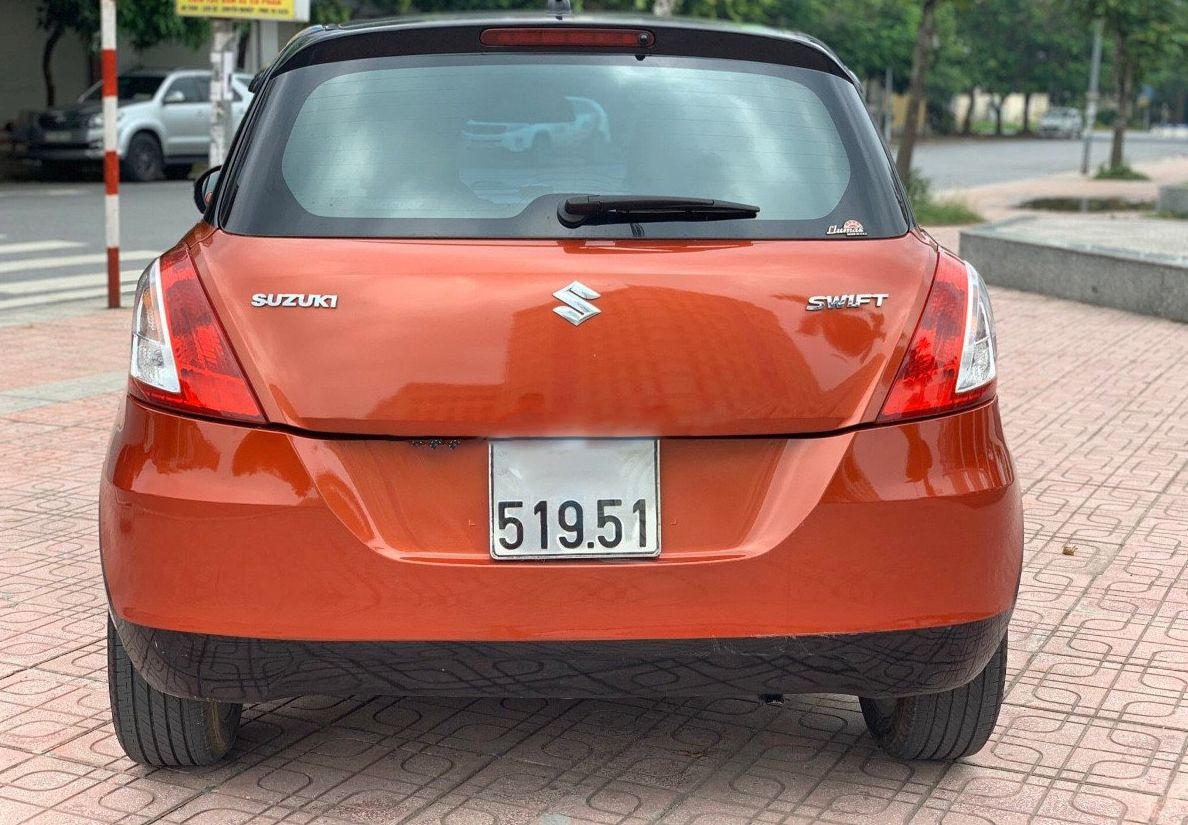 Cần bán Suzuki Swift 1.4AT năm 2014, màu đỏ, giá tốt