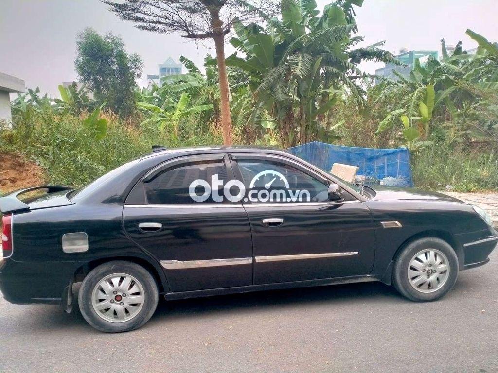 Daewoo Nubira  MT 2003 - Cần bán lại xe Daewoo Nubira MT năm sản xuất 2003, màu đen chính chủ