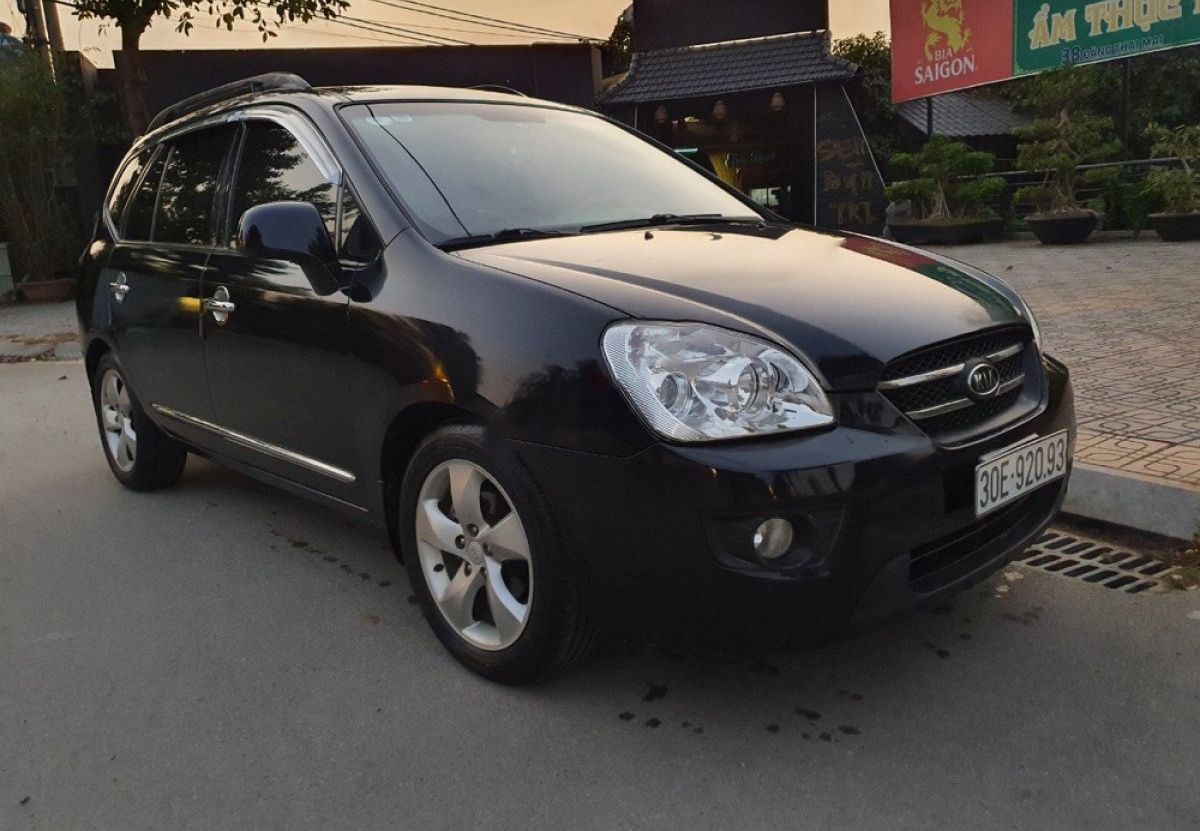 Kia Carens   2.0 AT 2009 - Cần bán gấp Kia Carens 2.0 AT năm sản xuất 2009, màu đen