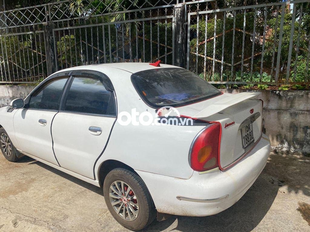 Daewoo Lanos  MT 2000 - Cần bán Daewoo Lanos MT năm sản xuất 2000, màu trắng, 48 triệu