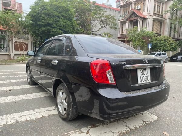 Daewoo Lacetti MT 2009 - Bán Daewoo Lacetti MT sản xuất năm 2009, màu đen, 145 triệu