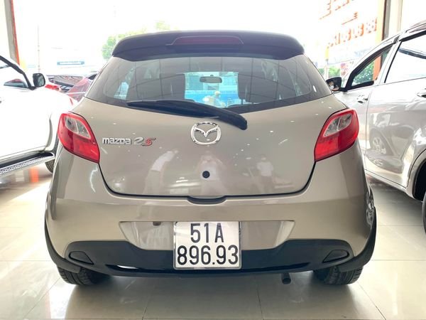 Mazda 2 1.5AT 2014 - Cần bán gấp Mazda 2 1.5AT năm 2014, màu vàng