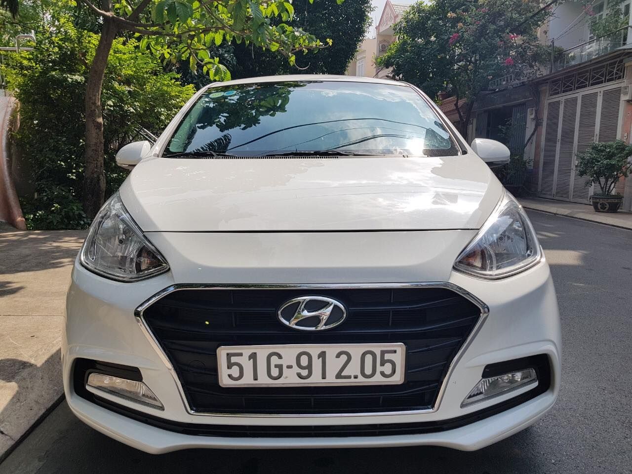 Hyundai Premio 2019 - Cần bán Hyundai Grand i10 sản xuất 2019, màu trắng, gđ sử dụng mới 98%