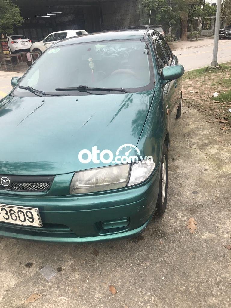 Mazda 323 1.6 MT 1999 - Bán Mazda 323 1.6 MT sản xuất 1999, màu xanh giá chỉ 62 triệu