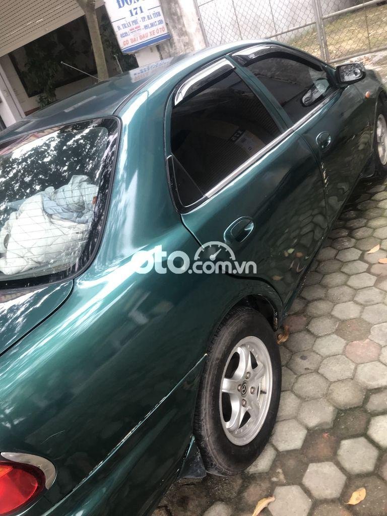 Mazda 323 1.6 MT 1999 - Bán Mazda 323 1.6 MT sản xuất 1999, màu xanh giá chỉ 62 triệu