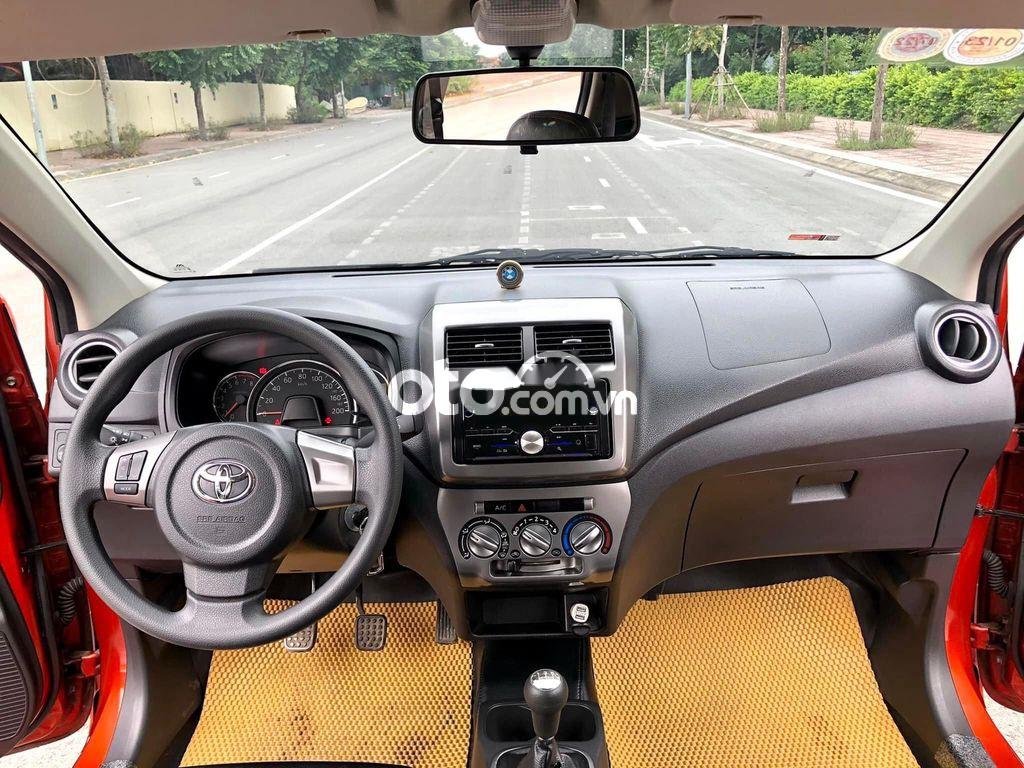 Toyota Wigo 1.2MT 2019 - Cần bán xe Toyota Wigo 1.2MT sản xuất 2019 màu cam, giá 282tr