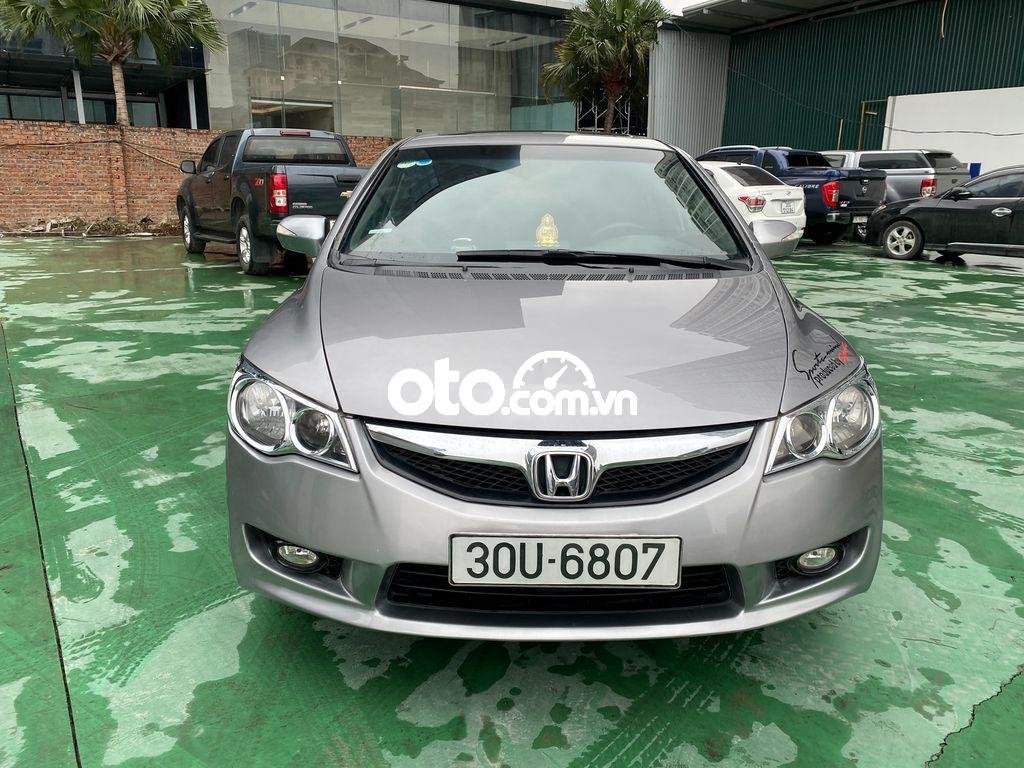 Honda Civic 2.0AT 2010 - Cần bán gấp Honda Civic 2.0AT sản xuất năm 2010, màu bạc xe gia đình