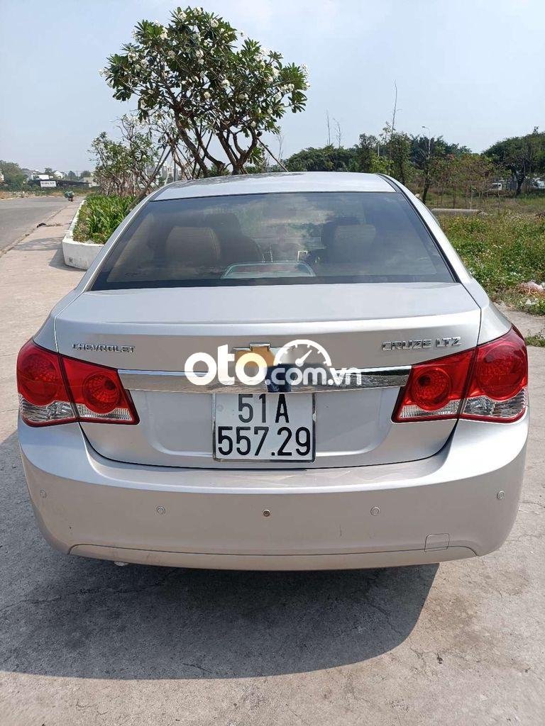 Chevrolet Cruze LTZ 2010 - Cần bán xe Chevrolet Cruze LTZ năm 2010, màu bạc, xe nhập như mới