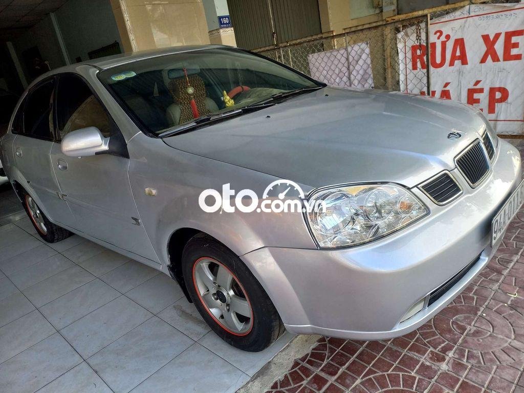 Daewoo Lacetti  EX 2005 - Cần bán gấp Daewoo Lacetti EX năm sản xuất 2005, màu bạc, giá 120tr