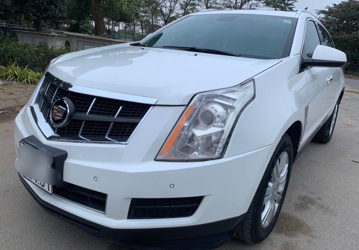 Cadillac SRX  3.0 V6 2010 - Bán Cadillac SRX 3.0 V6 sản xuất năm 2010, màu trắng, xe nhập chính chủ