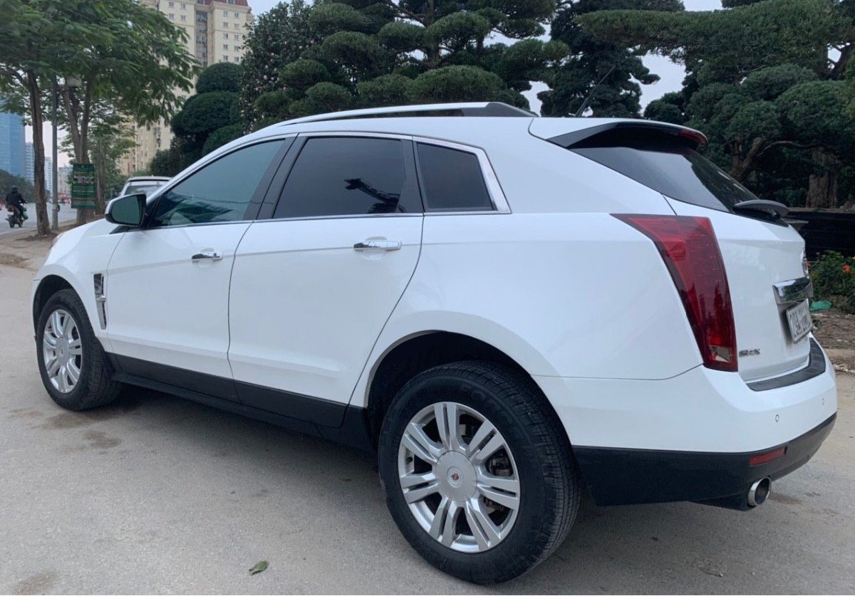 Cadillac SRX  3.0 V6 2010 - Bán Cadillac SRX 3.0 V6 sản xuất năm 2010, màu trắng, xe nhập chính chủ