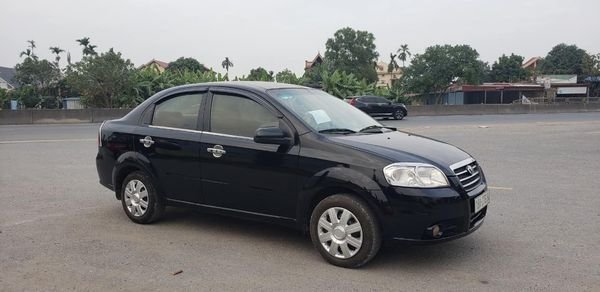 Daewoo Gentra 1.5MT 2010 - Cần bán Daewoo Gentra 1.5MT năm sản xuất 2010, màu đen xe gia đình