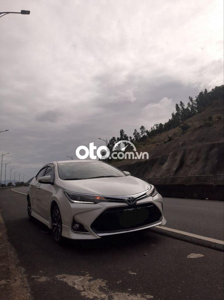 Toyota Corolla 1.8  G 2021 - Cần bán Toyota Corolla 1.8  G năm sản xuất 2021, màu trắng