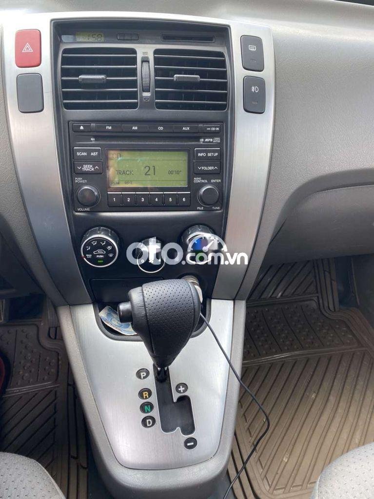 Hyundai Tucson AT  2009 - Bán xe Hyundai Tucson AT sản xuất năm 2009, màu vàng cát , nhập khẩu nguyên chiếc còn mới