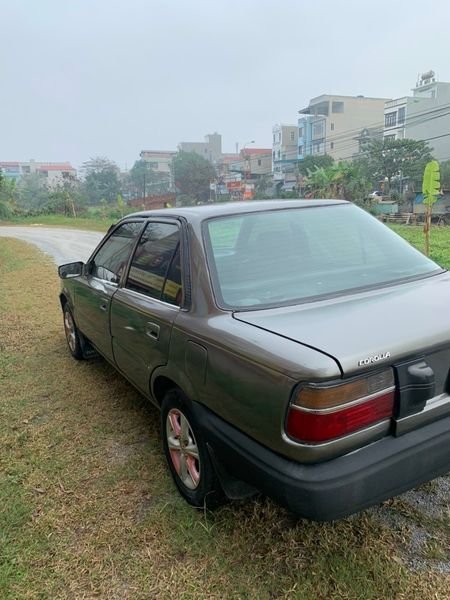 Toyota Corolla 1991 - Cần bán gấp Toyota Corolla 1.6 MT sản xuất 1991, màu xám