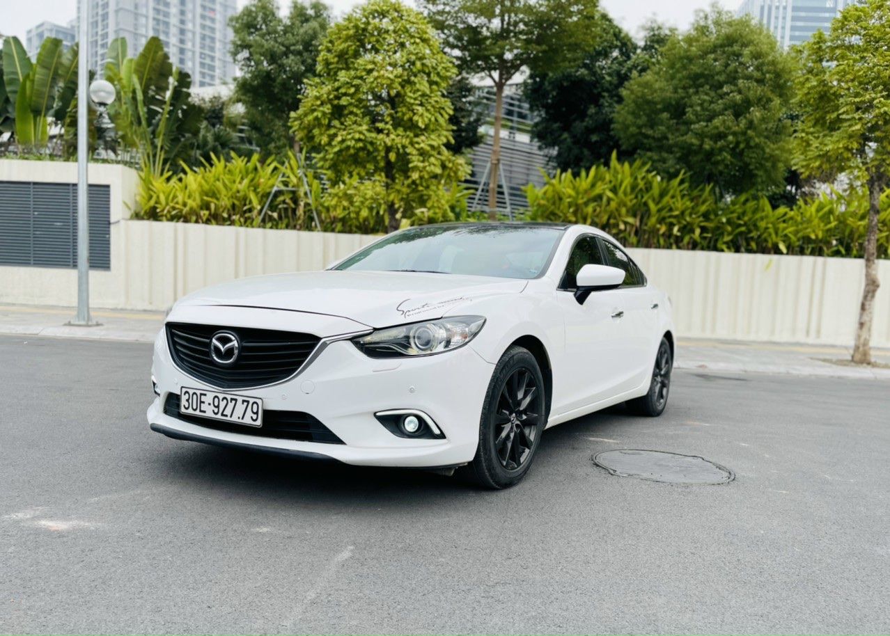 Mazda 6 2014 - Cần bán gấp Mazda 6 2.0AT, năm sản xuất 2014, màu trắng, chủ dùng rất cẩn thận, giữ gìn, xe nguyên bản 100%
