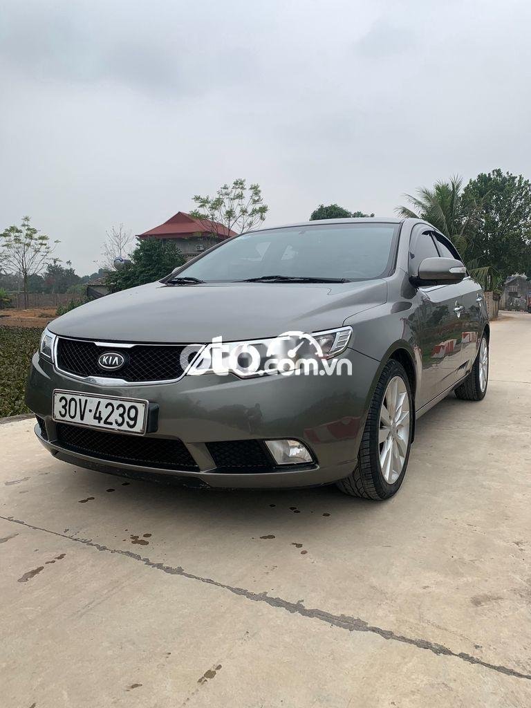 Kia Forte 2009 - Bán ô tô Kia Forte SLI 1.6AT sản xuất năm 2009, màu xám, nhập khẩu nguyên chiếc