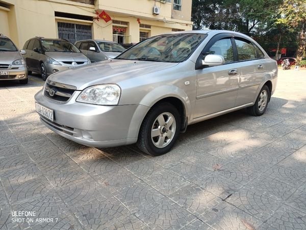 Daewoo Lacetti 2010 - Cần bán lại xe Daewoo Lacetti EX MT sản xuất 2010, màu bạc