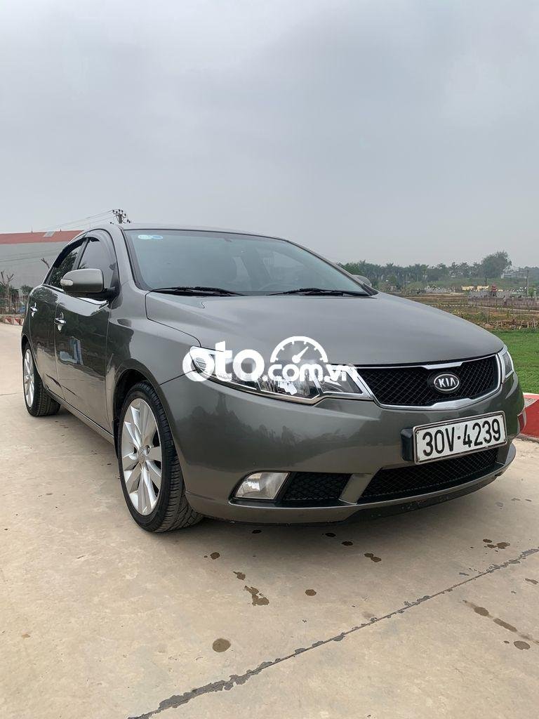 Kia Forte 2009 - Bán ô tô Kia Forte SLI 1.6AT sản xuất năm 2009, màu xám, nhập khẩu nguyên chiếc