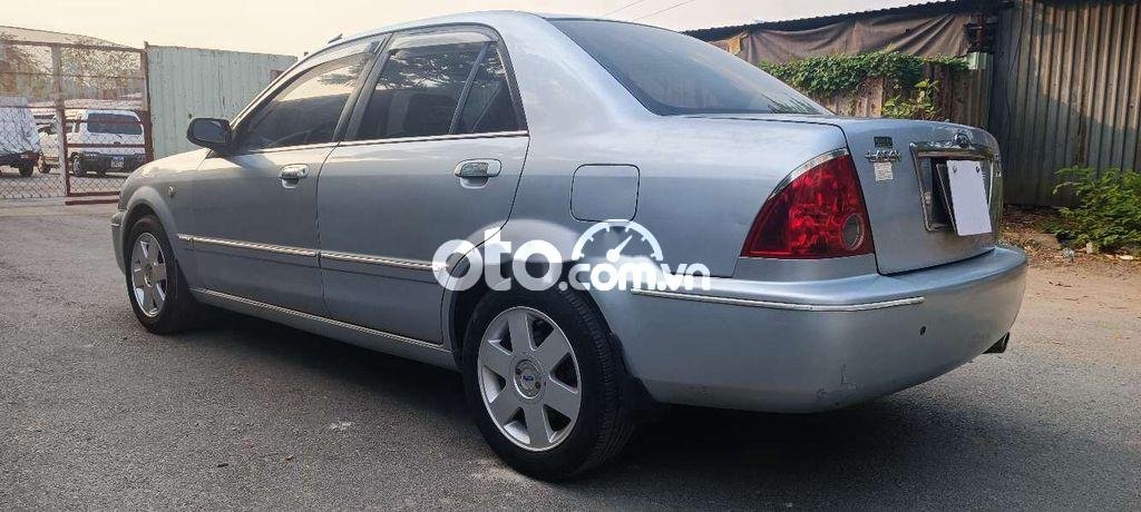 Ford Laser   Ghia 1.8 MT 2002 - Cần bán xe Ford Laser Ghia 1.8 MT sản xuất năm 2002, màu bạc 