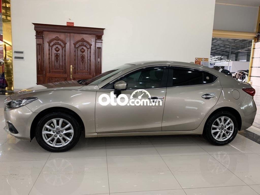 Mazda 3 1.5L Sedan 2016 - Cần bán gấp Mazda 3 1.5L Sedan sản xuất năm 2016, màu xám