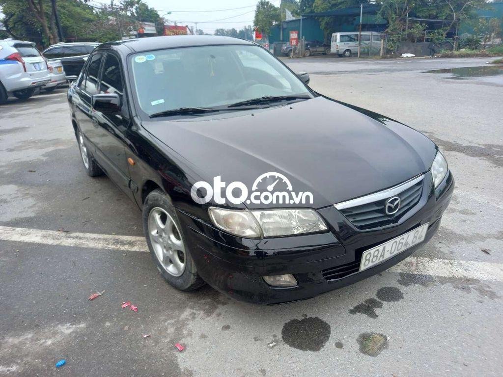 Mazda 626 MT 2003 - Bán xe Mazda 626 MT năm 2003, màu đen, nhập khẩu