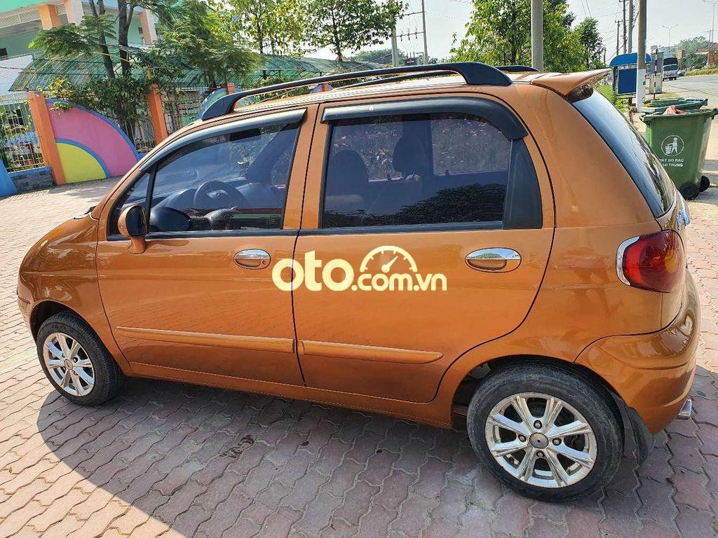 Daewoo Matiz MT 2003 - Cần bán lại xe Daewoo Matiz MT sản xuất 2003, màu nâu, giá tốt