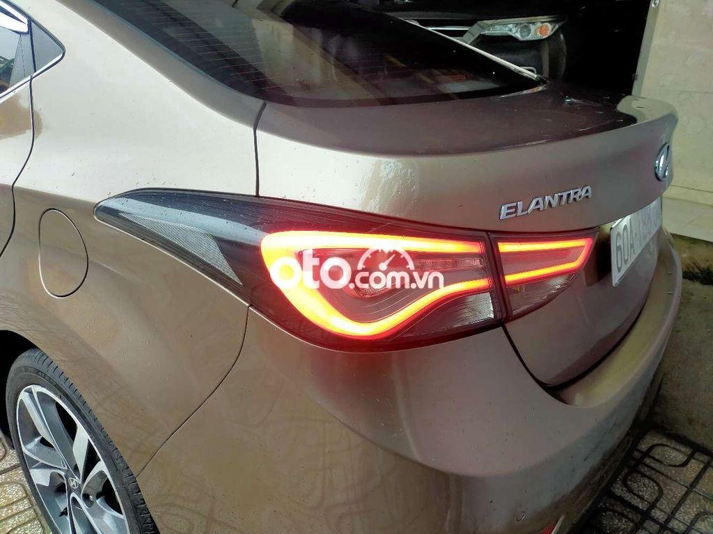 Hyundai Elantra 1.6 GLS  2014 - Bán ô tô Hyundai Elantra 1.6 GLS năm sản xuất 2014, màu nâu 