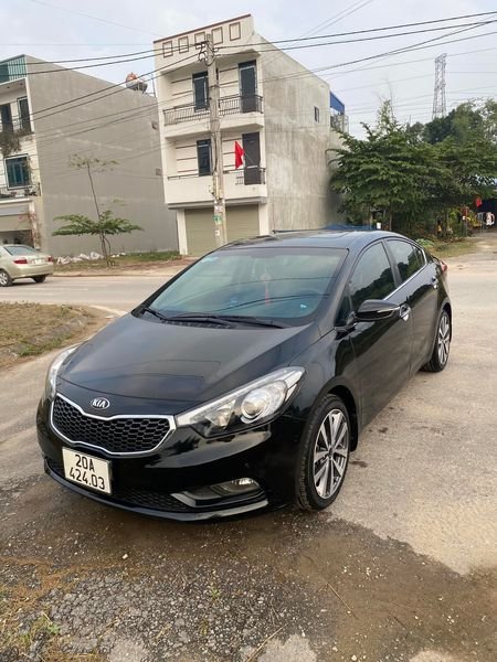 Kia K3 2014 - Cần bán gấp Kia K3 1.6AT sản xuất năm 2014, màu đen giá cạnh tranh