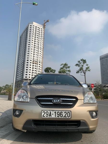 Kia Carens LX 2010 - Cần bán Kia Carens LX sản xuất năm 2010, màu nâu còn mới, giá chỉ 215 triệu