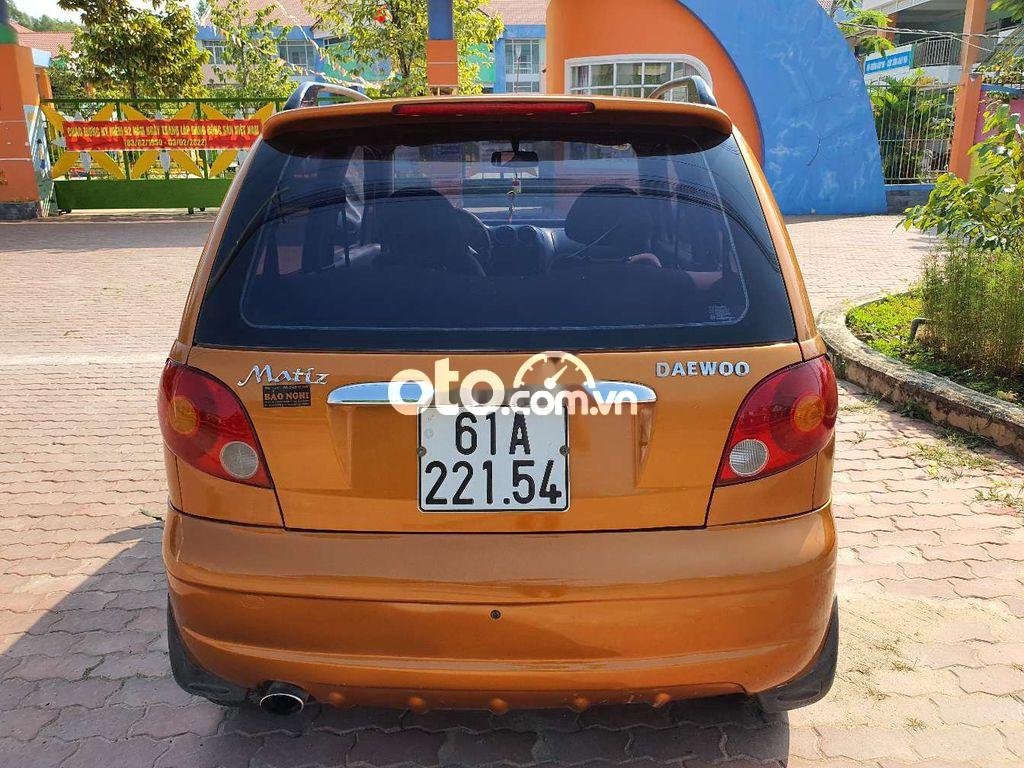 Daewoo Matiz MT 2003 - Cần bán lại xe Daewoo Matiz MT sản xuất 2003, màu nâu, giá tốt