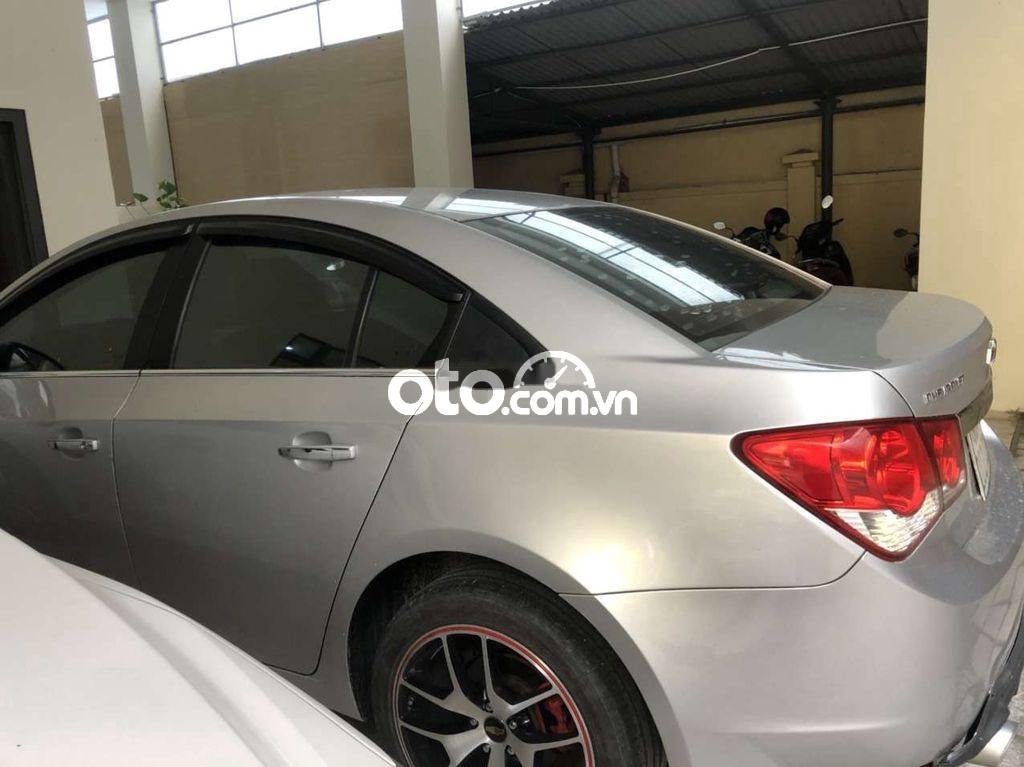 Chevrolet Cruze LTZ  2013 - Bán ô tô Chevrolet Cruze LTZ năm 2013, màu bạc như mới