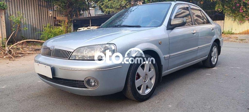 Ford Laser   Ghia 1.8 MT 2002 - Cần bán xe Ford Laser Ghia 1.8 MT sản xuất năm 2002, màu bạc 