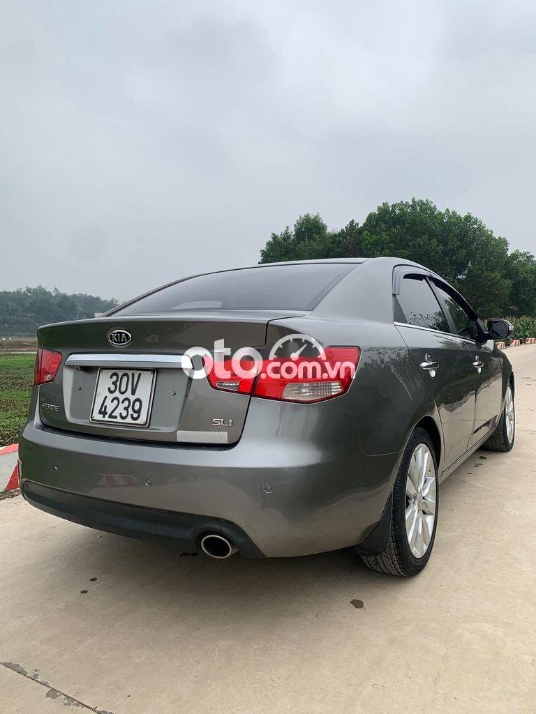 Kia Forte 2009 - Bán ô tô Kia Forte SLI 1.6AT sản xuất năm 2009, màu xám, nhập khẩu nguyên chiếc