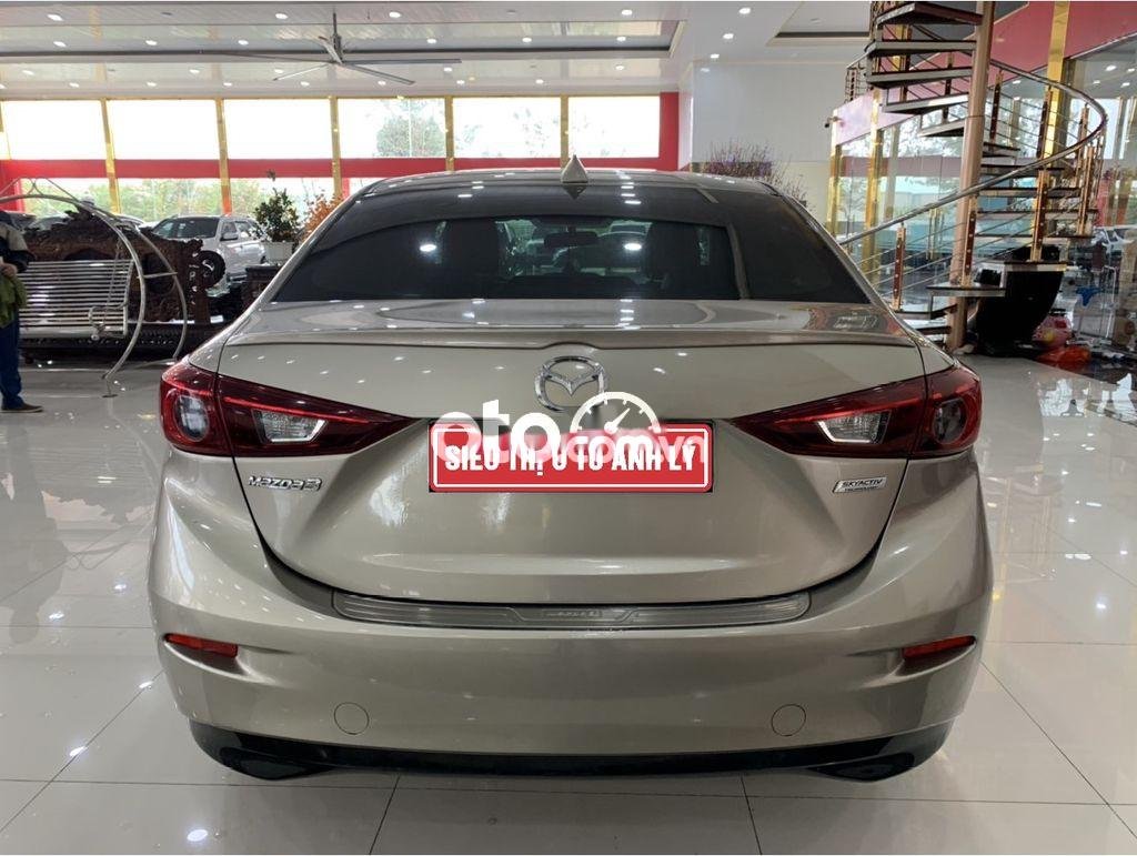 Mazda 3 1.5L Sedan 2016 - Cần bán gấp Mazda 3 1.5L Sedan sản xuất năm 2016, màu xám