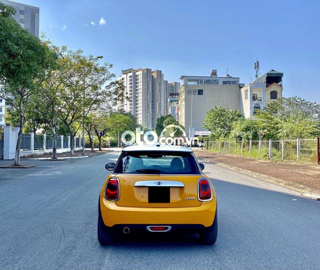 Mini Cooper  1.5 Turbo  2014 - Cần bán xe Mini Cooper 1.5 Turbo năm 2014, màu vàng, nhập khẩu nguyên chiếc