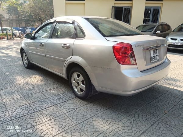 Daewoo Lacetti 2010 - Cần bán lại xe Daewoo Lacetti EX MT sản xuất 2010, màu bạc