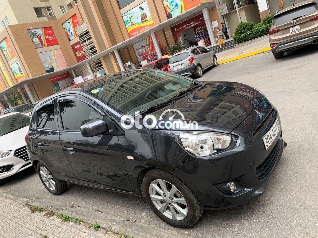 Mitsubishi Mirage MT 2014 - Bán Mitsubishi Mirage MT sản xuất năm 2014, màu xám, nhập khẩu