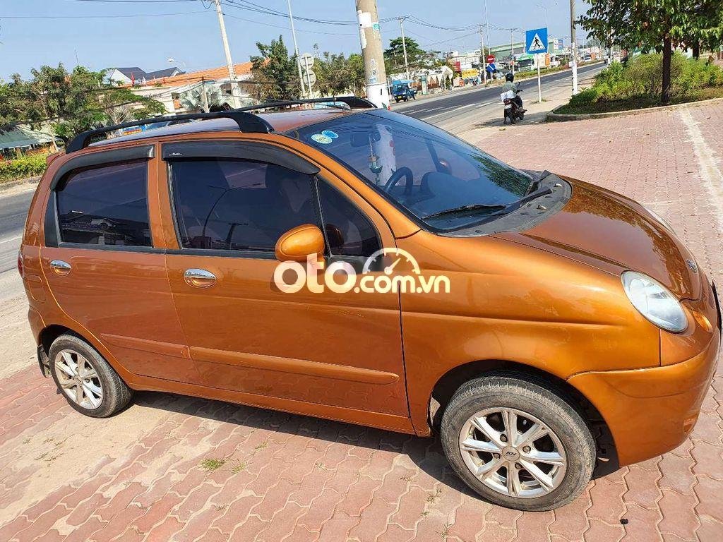 Daewoo Matiz MT 2003 - Cần bán lại xe Daewoo Matiz MT sản xuất 2003, màu nâu, giá tốt