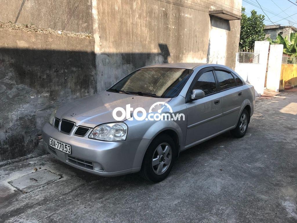 Daewoo Lacetti MT 2004 - Bán Daewoo Lacetti MT năm sản xuất 2004, màu bạc, 101tr