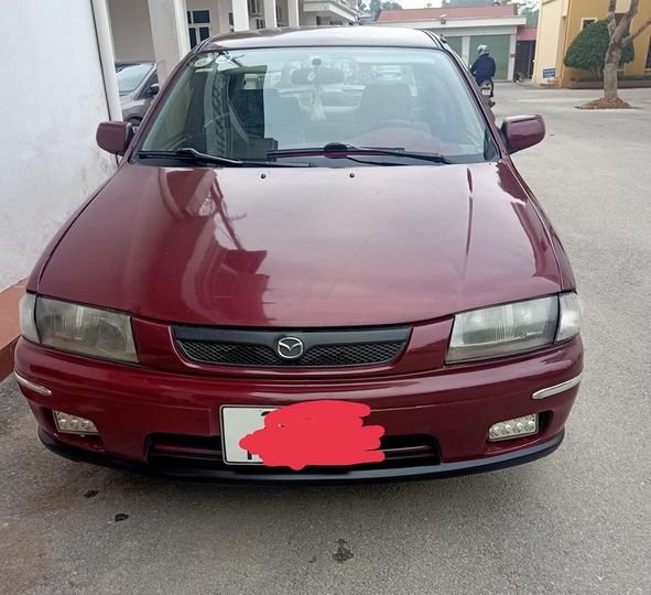 Mazda 323 MT 1997 - Bán Mazda 323 MT sản xuất 1997, màu đỏ